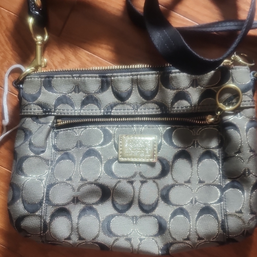 Coach Black and Gold Crossbody Bag with Luxurious Accents